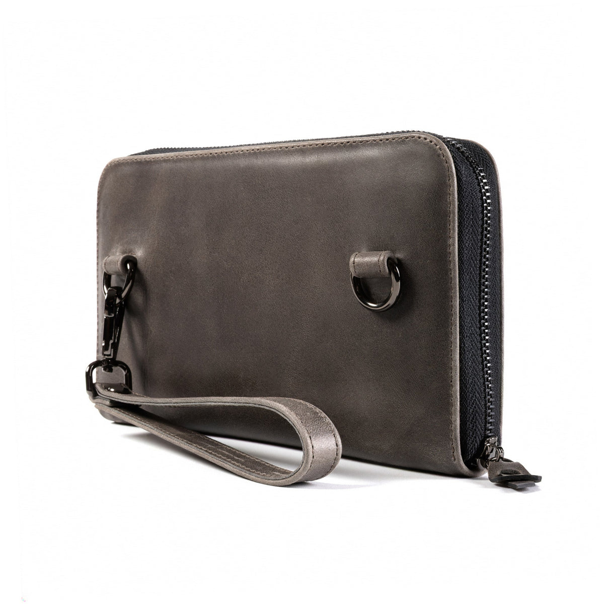 A dark gray leather zip-around wallet with a wristlet strap and metal hardware, shown on a plain white background.