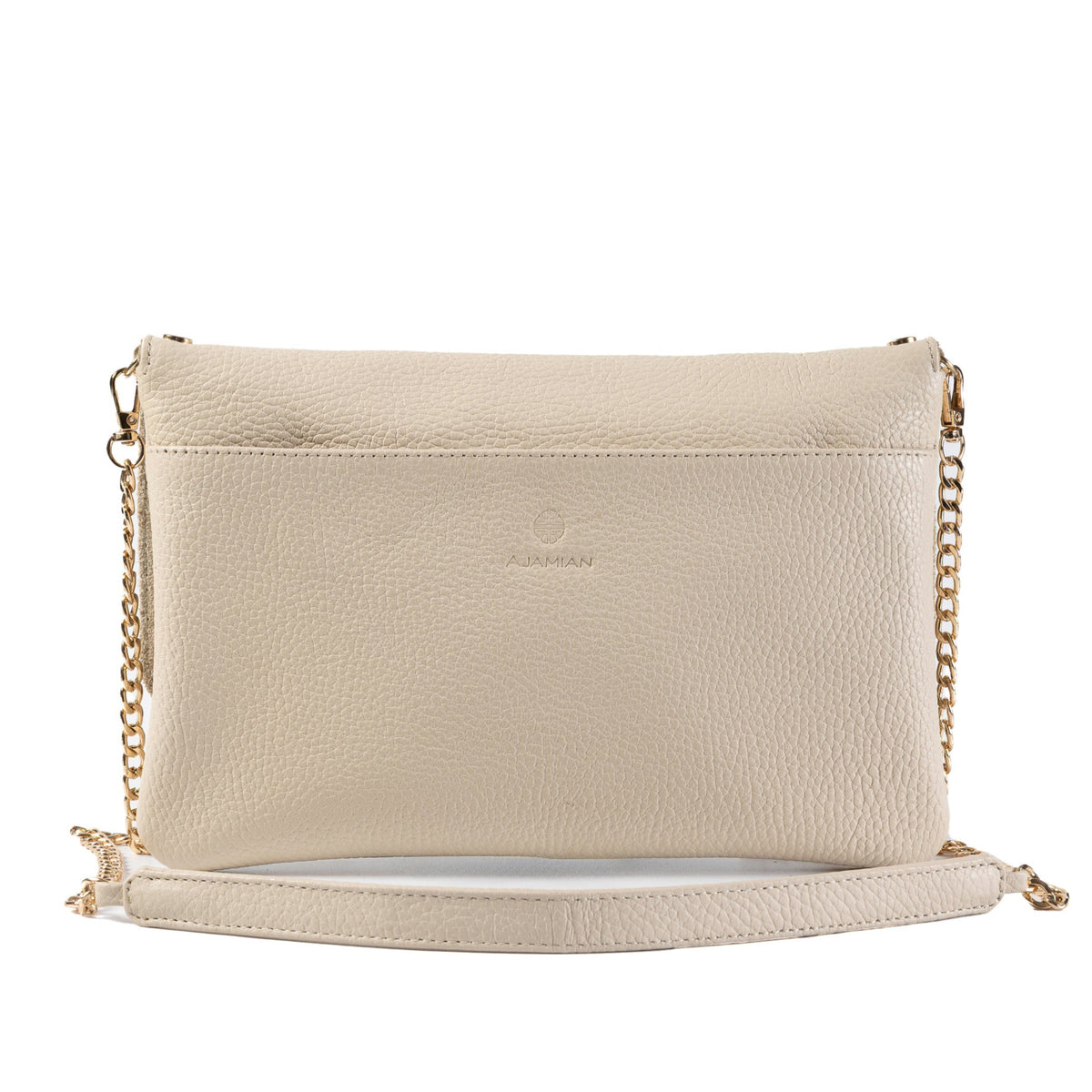 A light beige leather crossbody bag with a gold chain strap and a matching leather wristlet strap, shown against a plain white background.