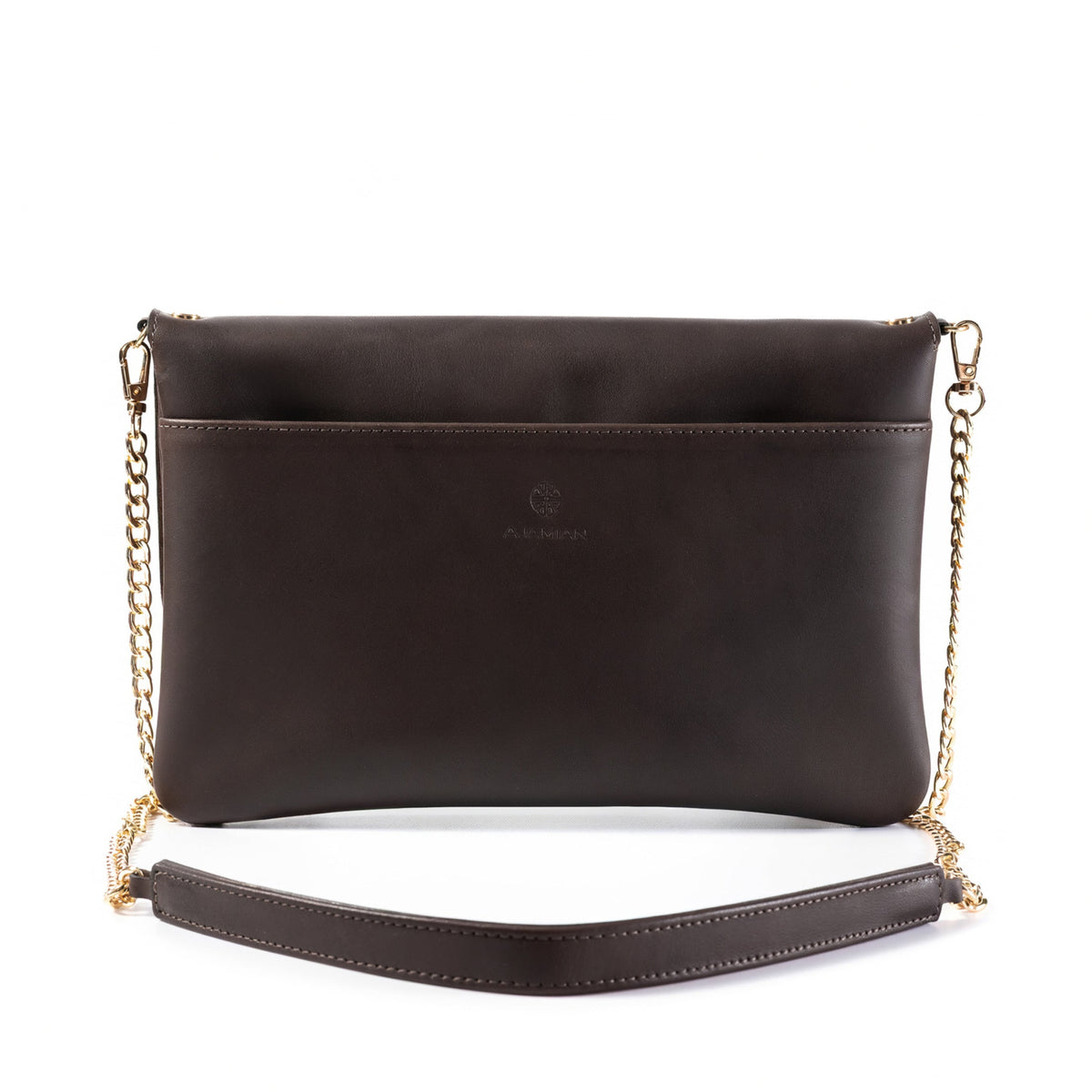 A dark brown leather crossbody bag with a gold chain strap and a matching leather wristlet, shown against a plain white background.