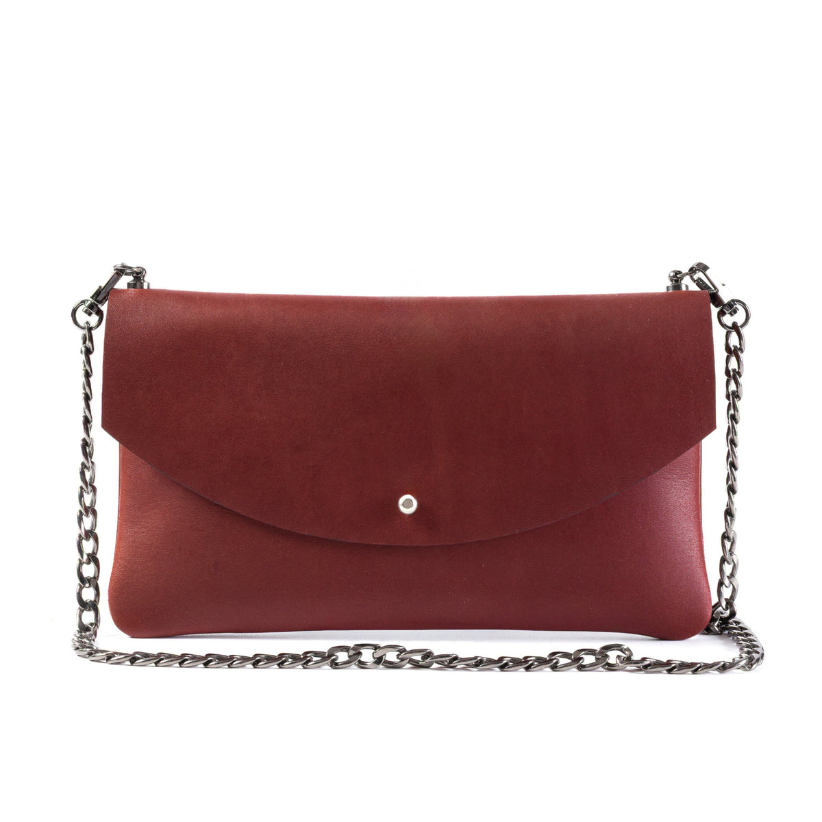 A small envelope-style shoulder bag in deep burgundy red with a silver-tone chain strap and a small silver snap button on the front flap, shown against a plain white background.