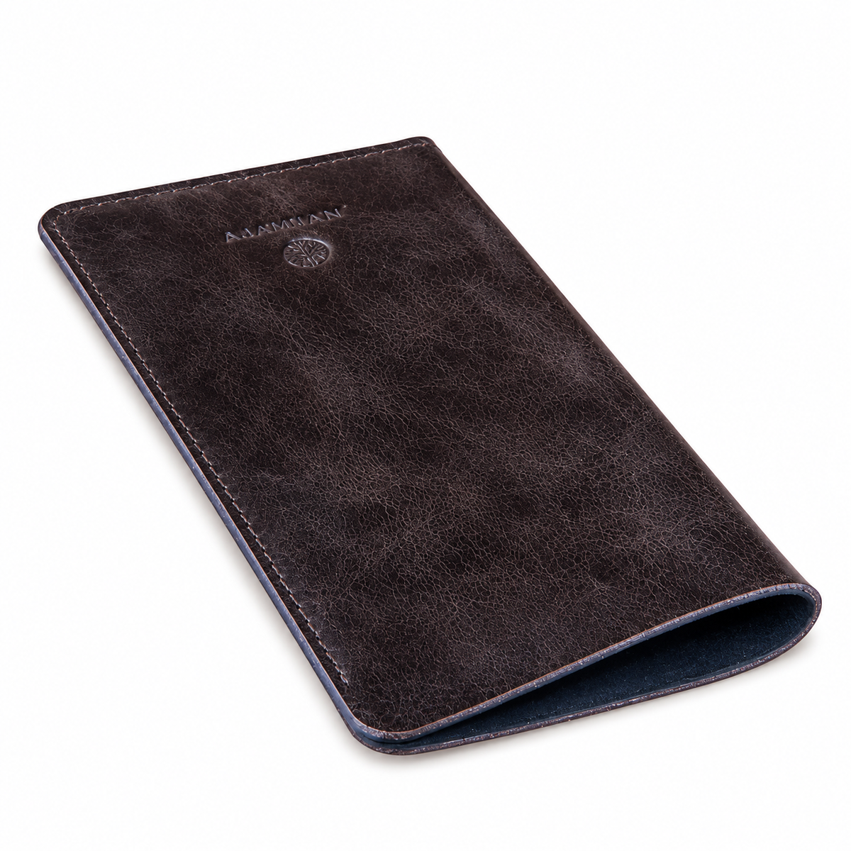 A dark brown textured leather sleeve or wallet with a debossed circular logo and the brand name 'ALMA MATER' on the upper left, shown on a plain white background.