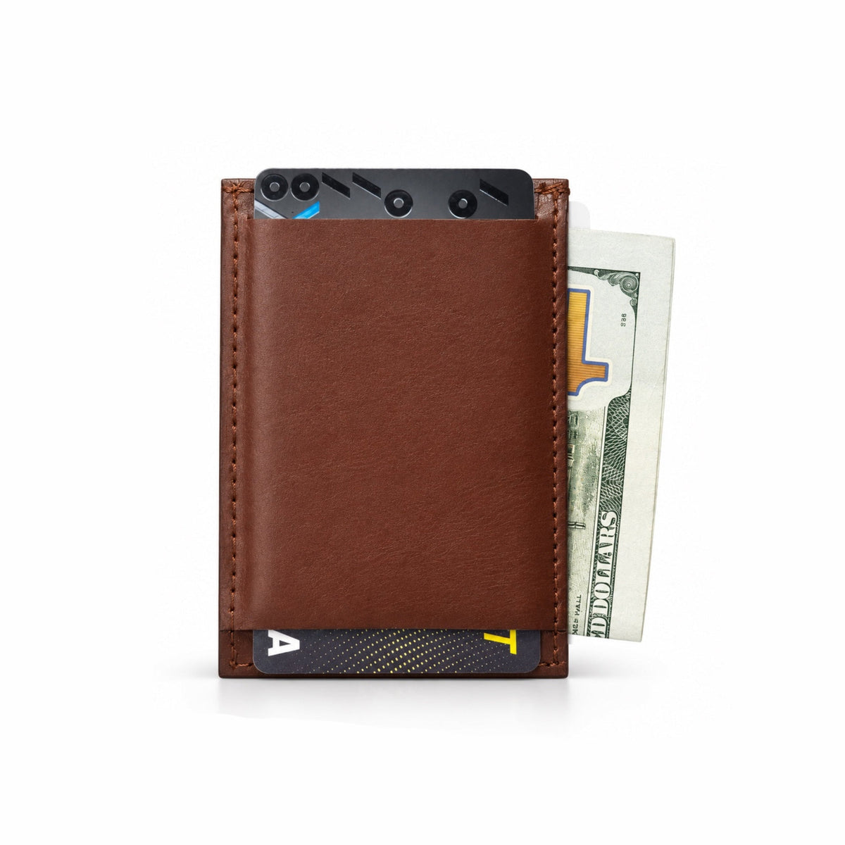 A brown leather minimalist cardholder wallet shown on a white background, holding a black smartphone, cards, and a dollar bill.